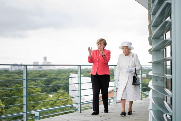 BERLIN, GERMANY - JUNE 24: In this photo provided by the German Government Press Office (BPA), Angela Merkel welcomes Queen Elizabeth II upon her arrival at the Federal Chancellery on the second of the royal couple's four-day visit to Germany on June 24, 2015 in Berlin, Germany. The Queen and Prince Philip are scheduled to visit Berlin, Frankfurt and the concentration camp memorial at Bergen-Belsen during their trip, which is their first to Germany since 2004. (Photo by Bergmann/Bundesregierung via Getty Images)