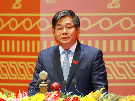 Ô. Bùi Quang Vinh, Bộ trưởng Bộ Kế Hoạch và Đầu Tư tham luận về đẩy mạnh cải cách thể chế- Ảnh: TTXVN