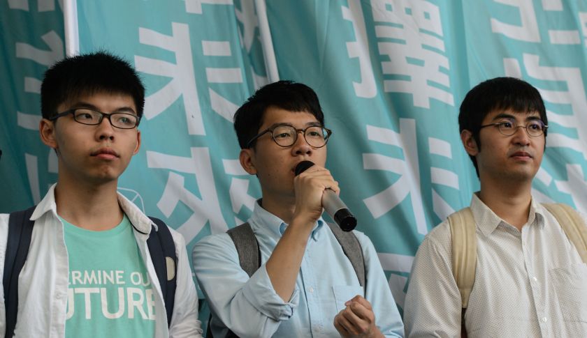 Những nhà hoạt động dân chủ trẻ và thành viên của Đảng Demosisto, từ trái sang phải: Joshua Wong, Nathan Law và Alex Cho. Ảnh: AFP/ Getty Images 